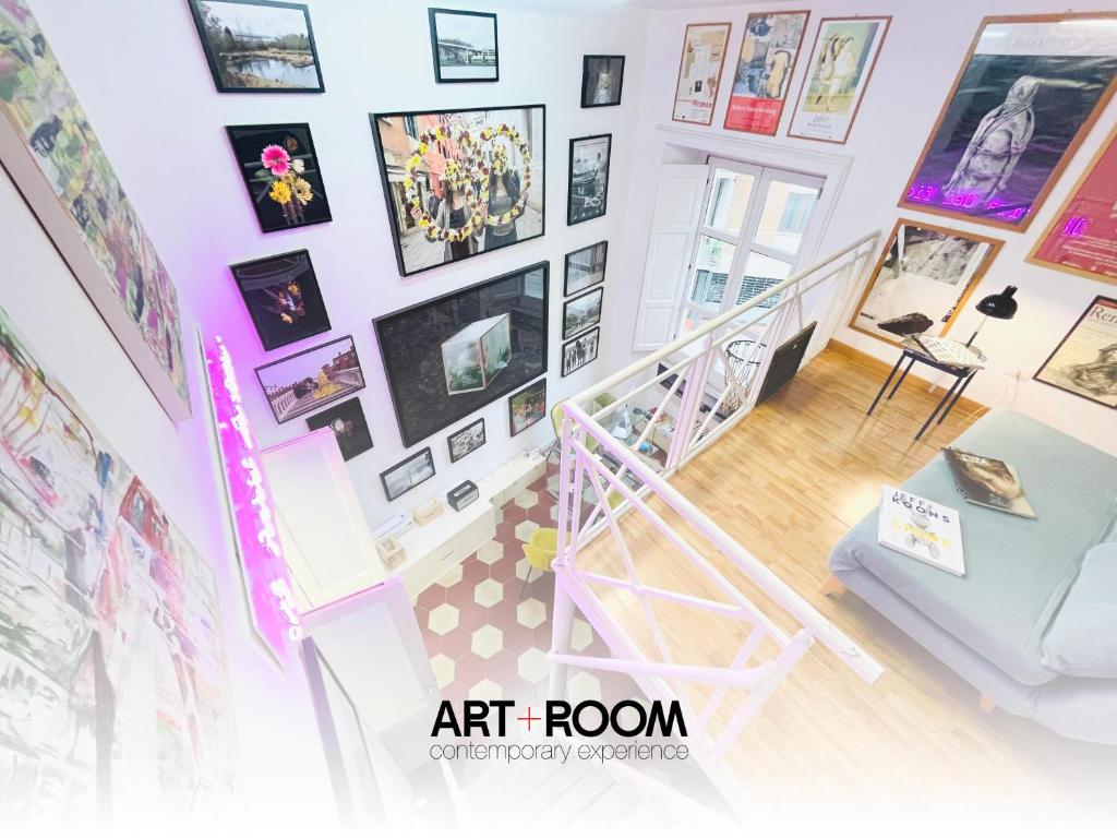 an art room with pictures on the wall at Hackert Art Room Apartment in Caserta