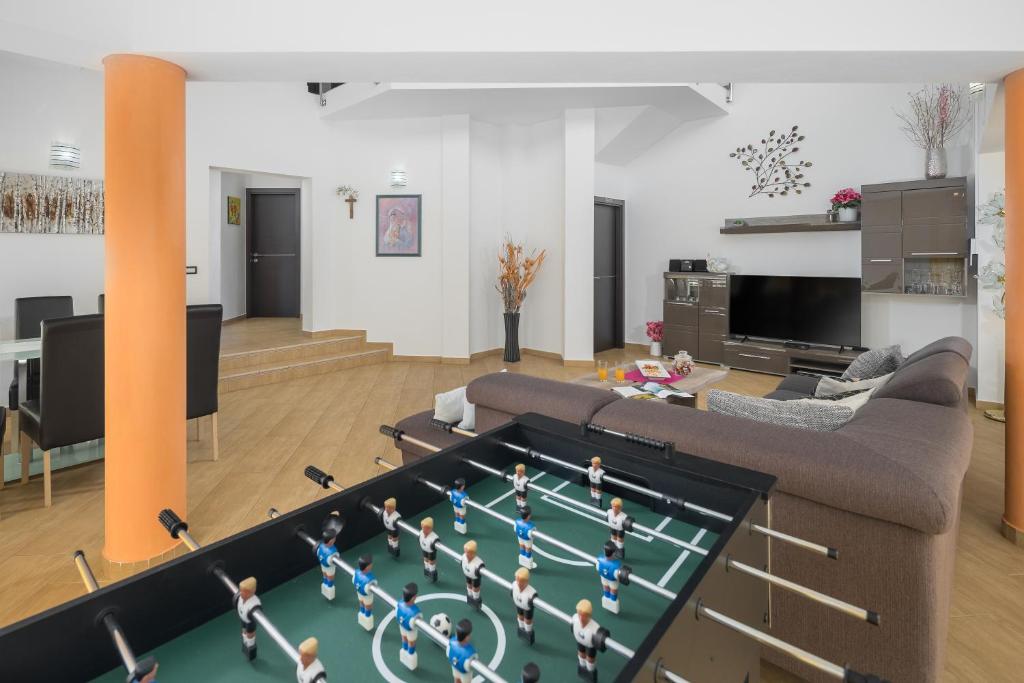 Telewizja i/lub zestaw kina domowego w obiekcie Villa Brcina