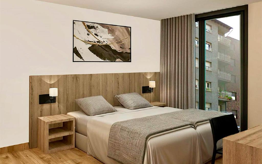 Postel nebo postele na pokoji v ubytování Hotel Cervol