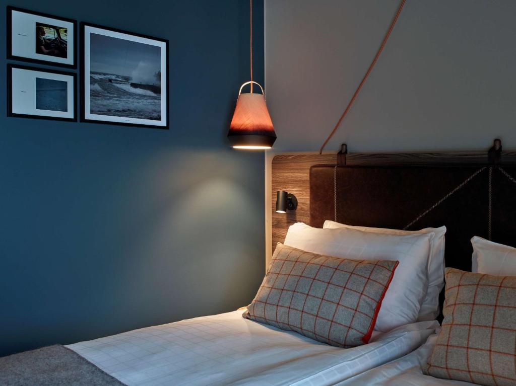 Postel nebo postele na pokoji v ubytování Downtown Camper by Scandic