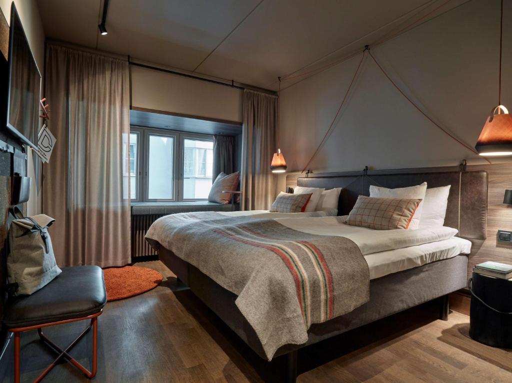 Postel nebo postele na pokoji v ubytování Downtown Camper by Scandic