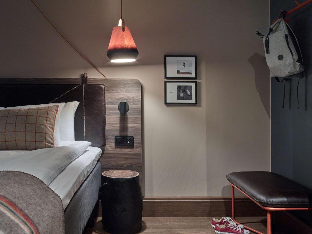 Postel nebo postele na pokoji v ubytování Downtown Camper by Scandic