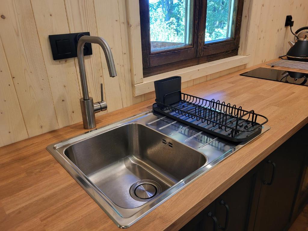 Kuchyň nebo kuchyňský kout v ubytování Glamping maringotka Free country Vogelsang