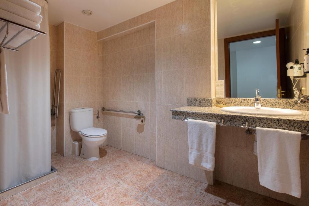 Koupelna v ubytování Hotel Cervol
