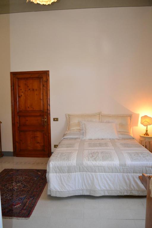 Postel nebo postele na pokoji v ubytování Cosetta Guest House