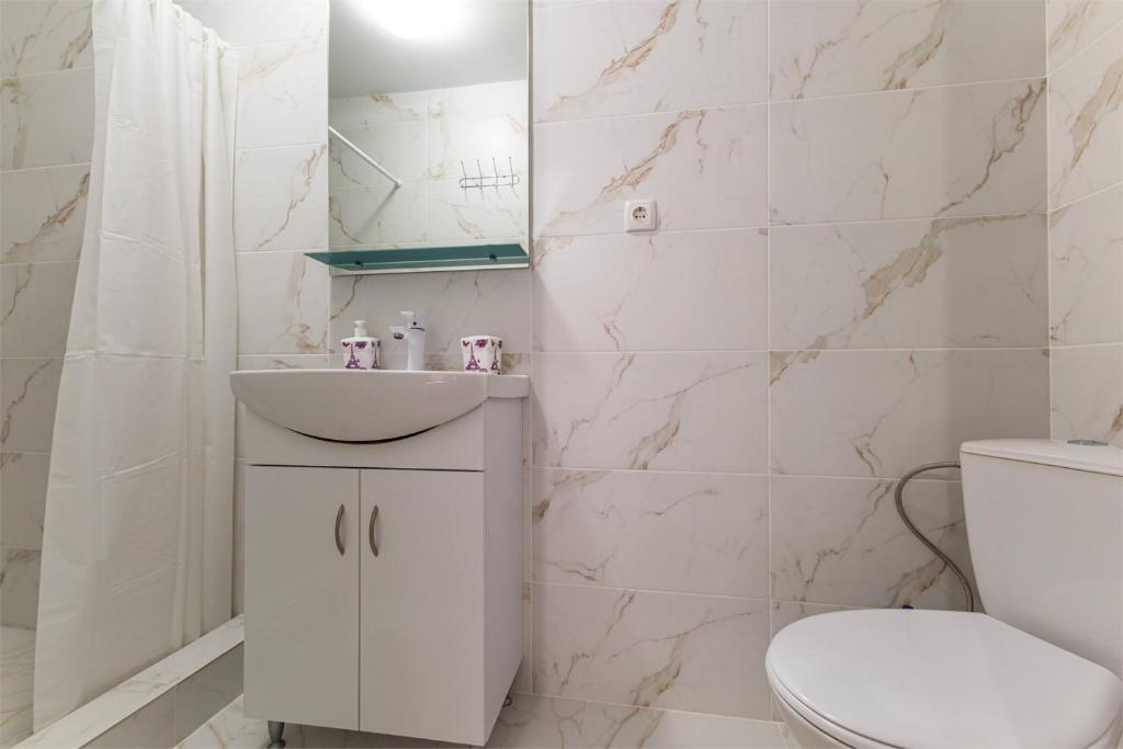 Koupelna v ubytování Hotel Halas