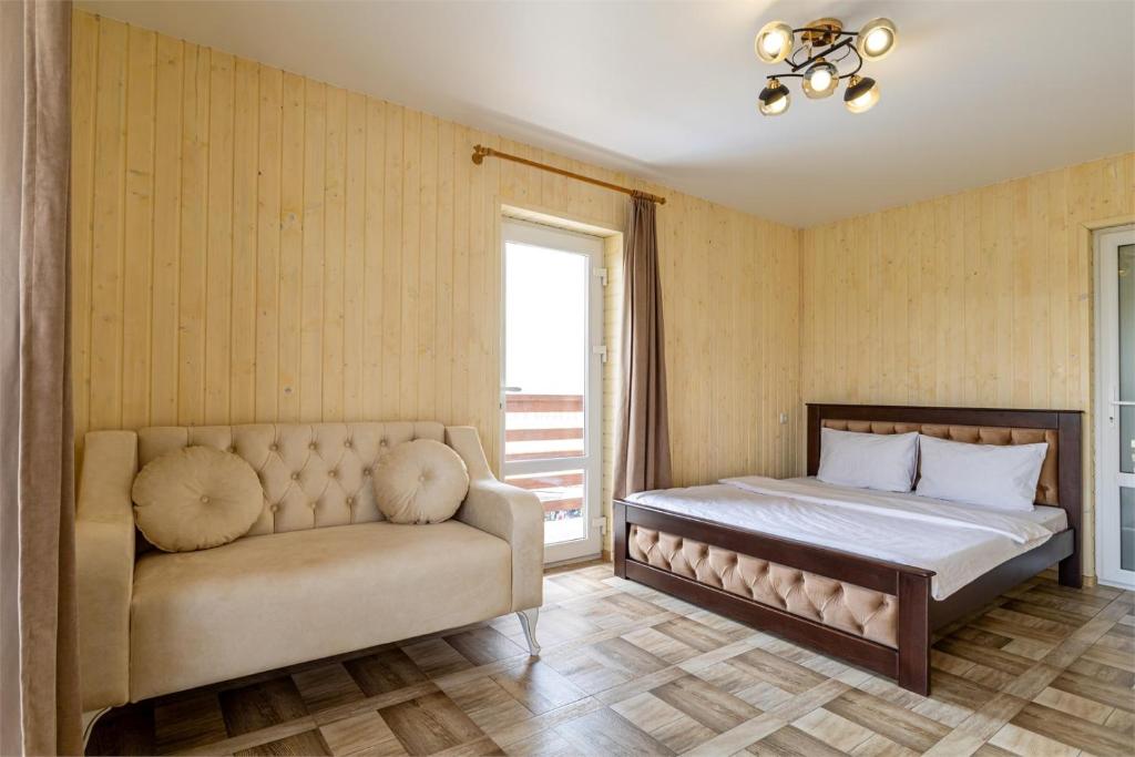 Postel nebo postele na pokoji v ubytování Hotel Halas