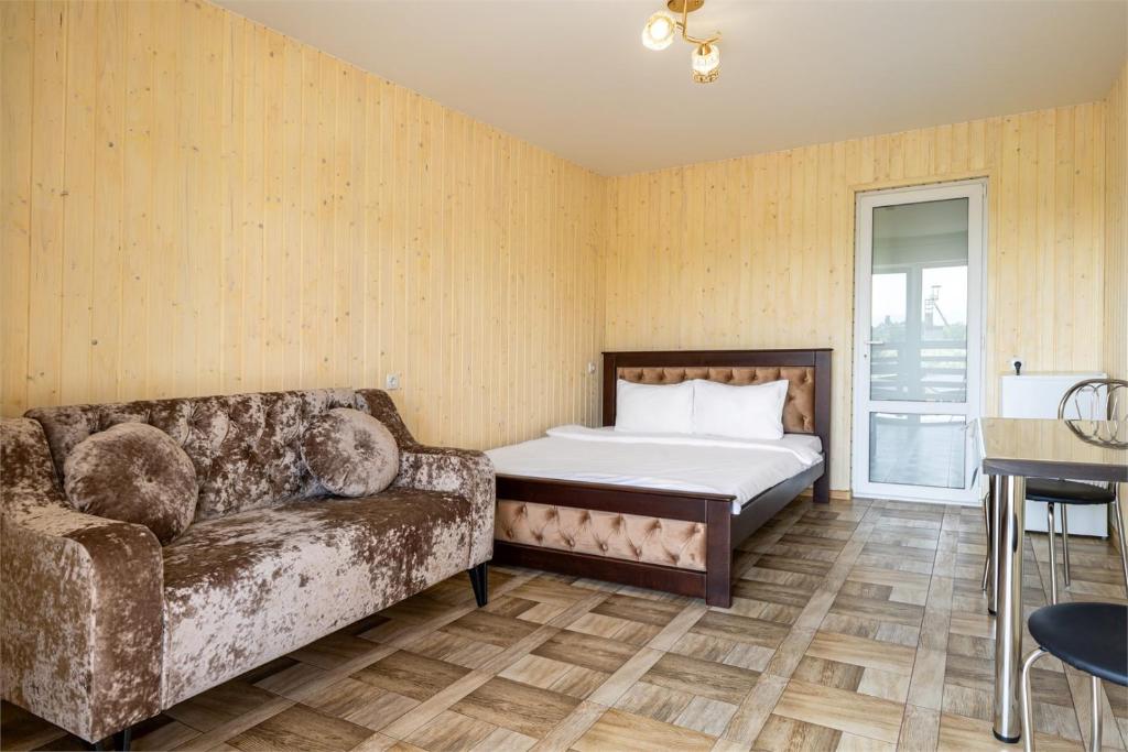 Postel nebo postele na pokoji v ubytování Hotel Halas