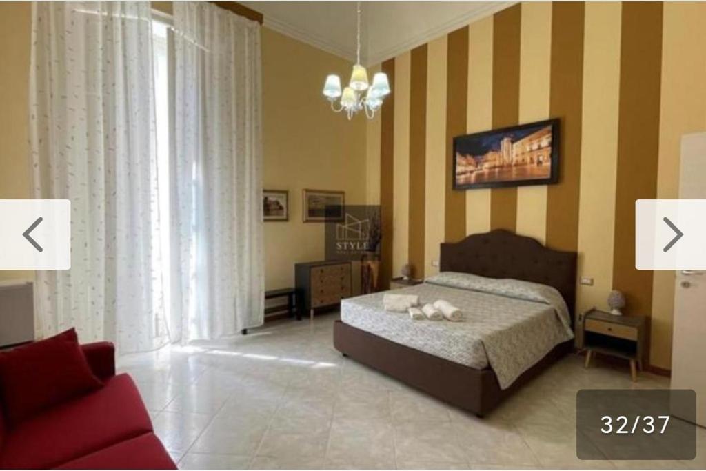 Postel nebo postele na pokoji v ubytování Mille e una notte house