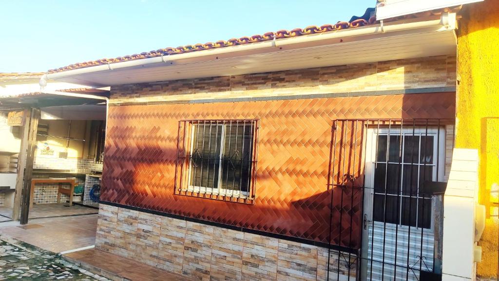 un mural en el costado de un edificio en Casa Completa COP30, en Mosqueiro