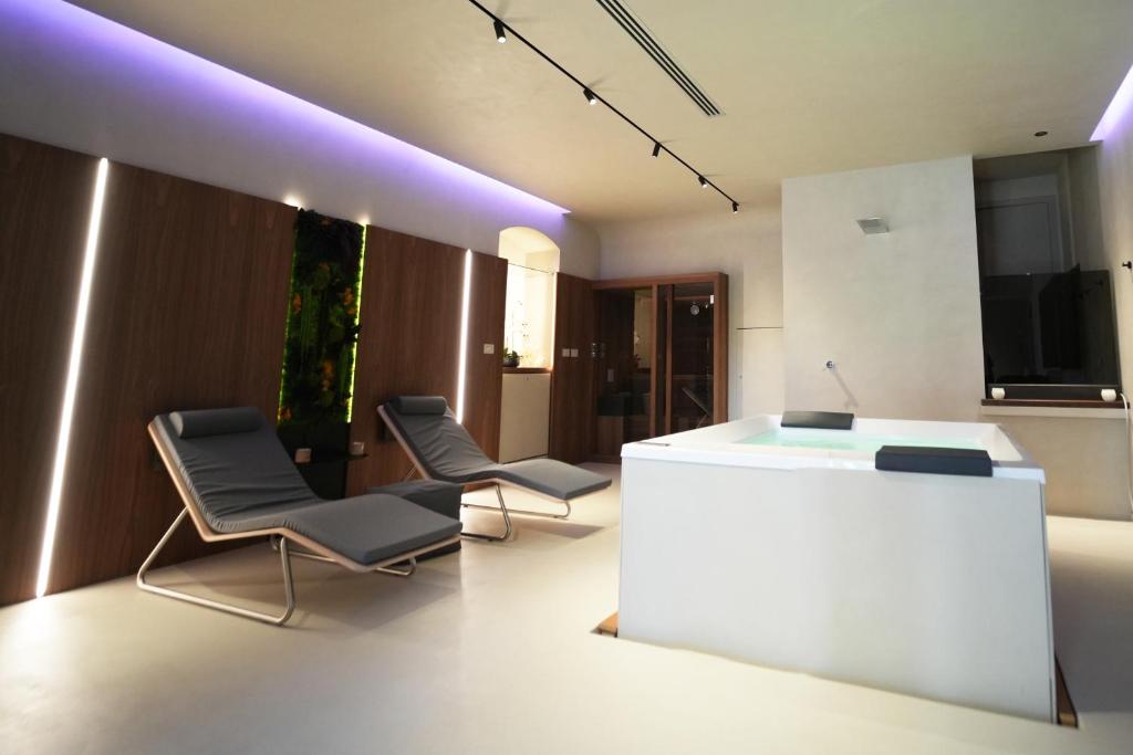 Posezení v ubytování La Scordata Luxury Apartment & Private Spa