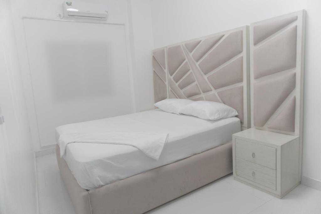 Postel nebo postele na pokoji v ubytování Apartamento Ciudad Del Surf Montañita