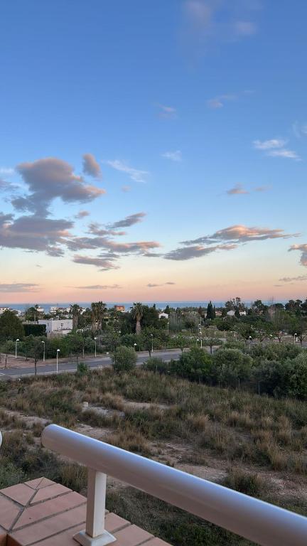 a view of a city from a balcony with a fence at Torre la Sal - Encanto natural 2 in Cabanes
