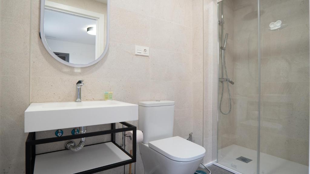 Koupelna v ubytování Hostal Calaya