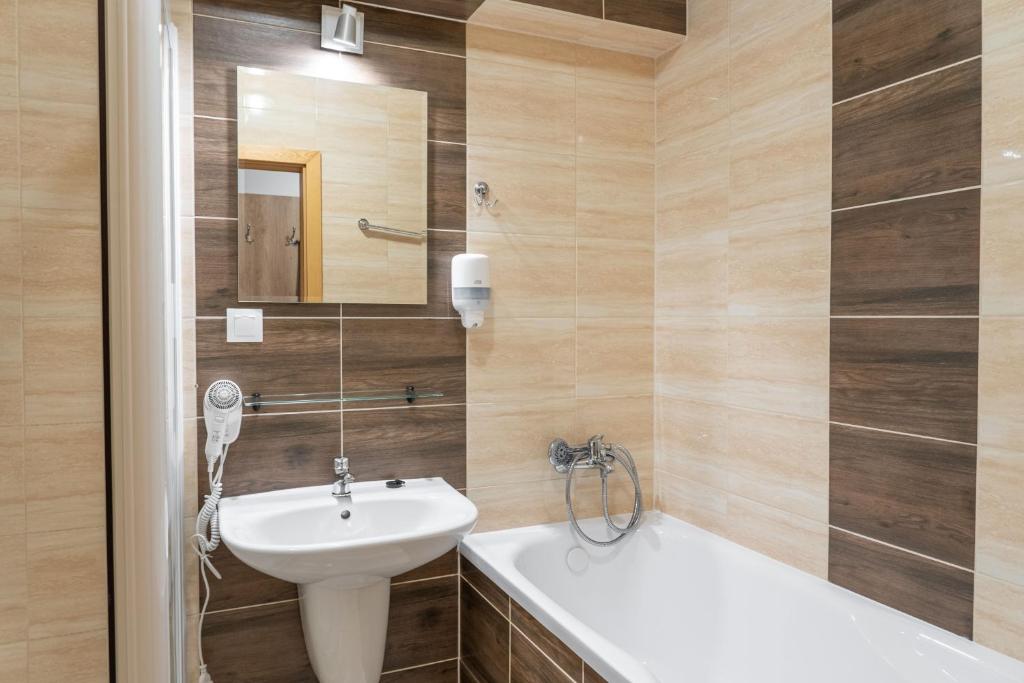 Koupelna v ubytování Hotel Toliar