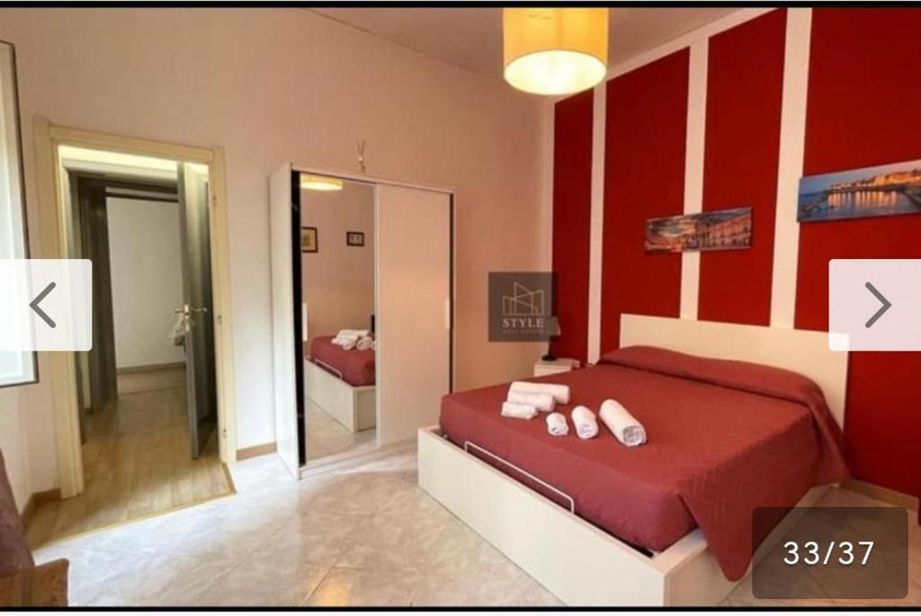Postel nebo postele na pokoji v ubytování Mille e una notte house