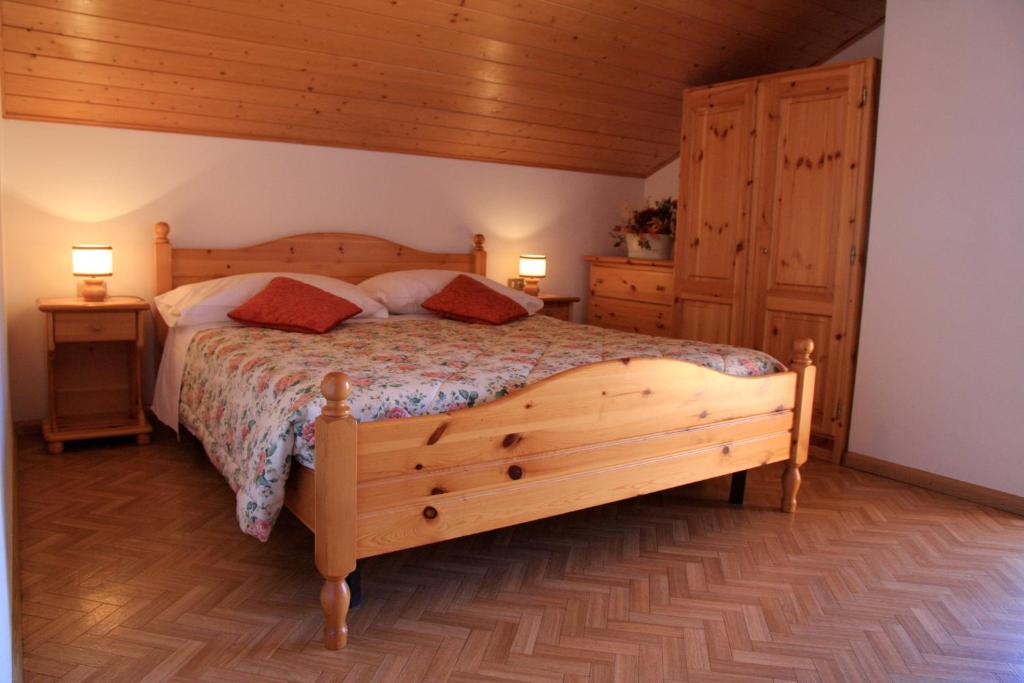 Łóżko lub łóżka w pokoju w obiekcie Residence Villa Boschetto