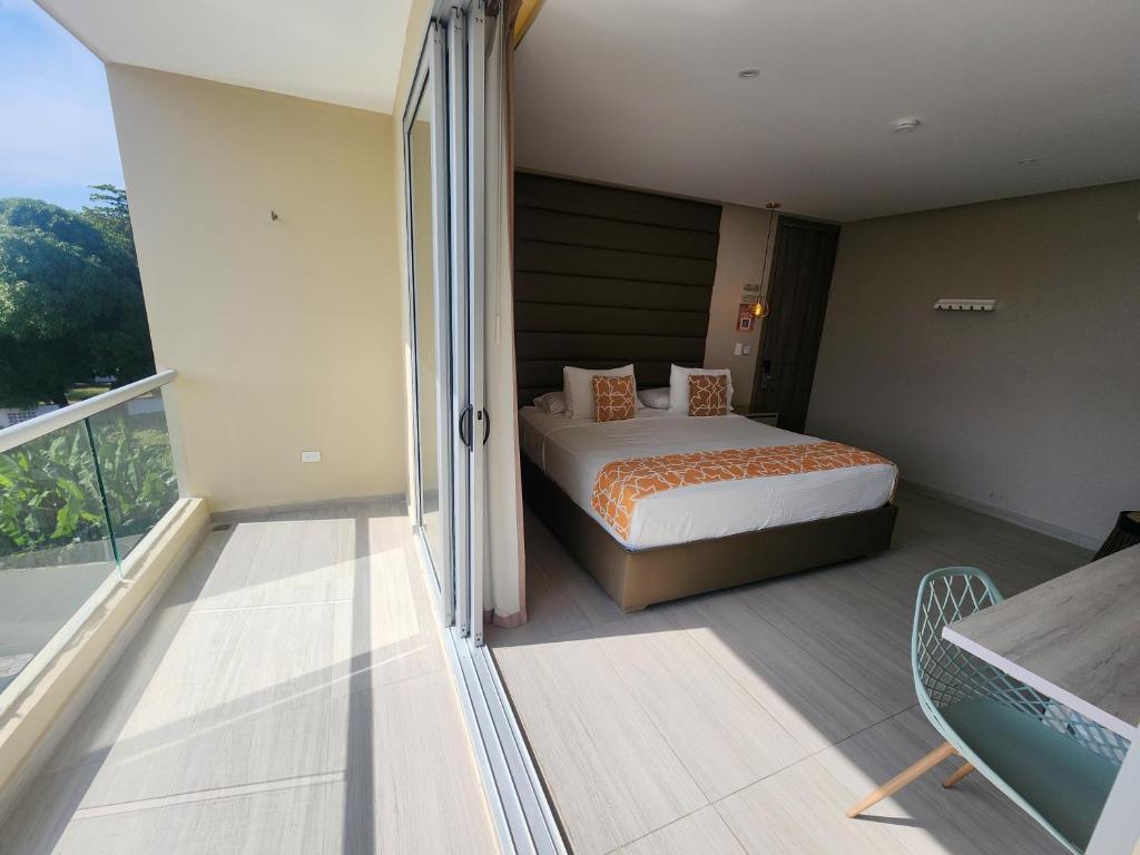 Postel nebo postele na pokoji v ubytování Hotel y Cabañas Covemar