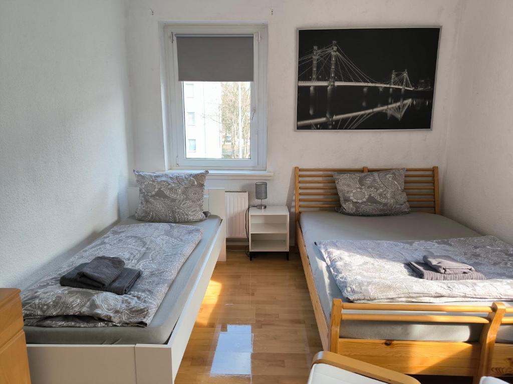 Ένα ή περισσότερα κρεβάτια σε δωμάτιο στο Apartment am Südpark