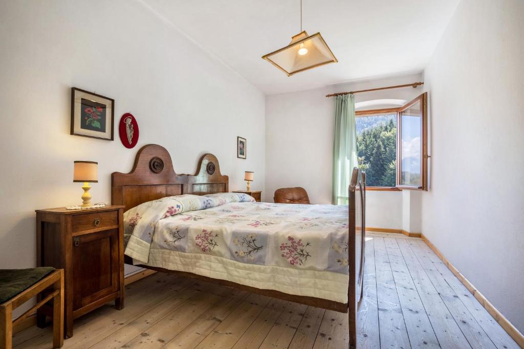 Postel nebo postele na pokoji v ubytování Casa nel Borgo Edera