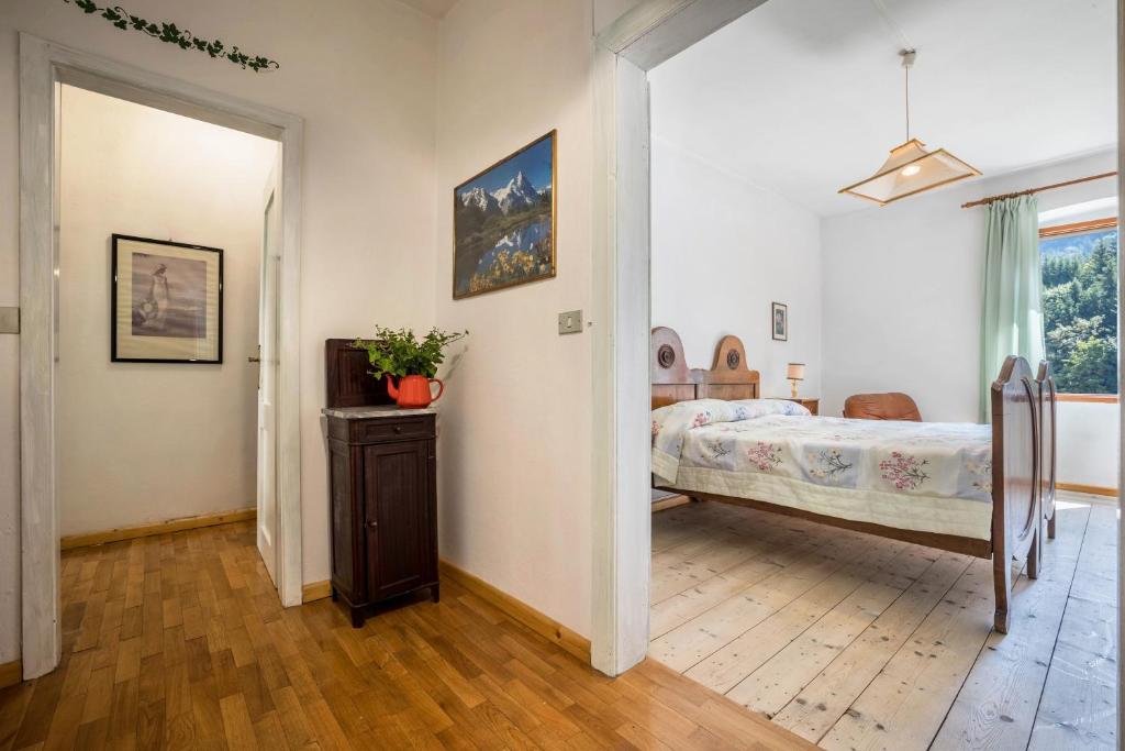 Postel nebo postele na pokoji v ubytování Casa nel Borgo Edera