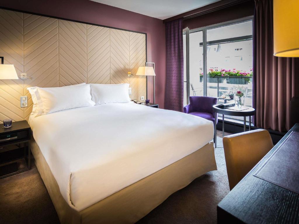 Postel nebo postele na pokoji v ubytování Sofitel Strasbourg Grande Ile