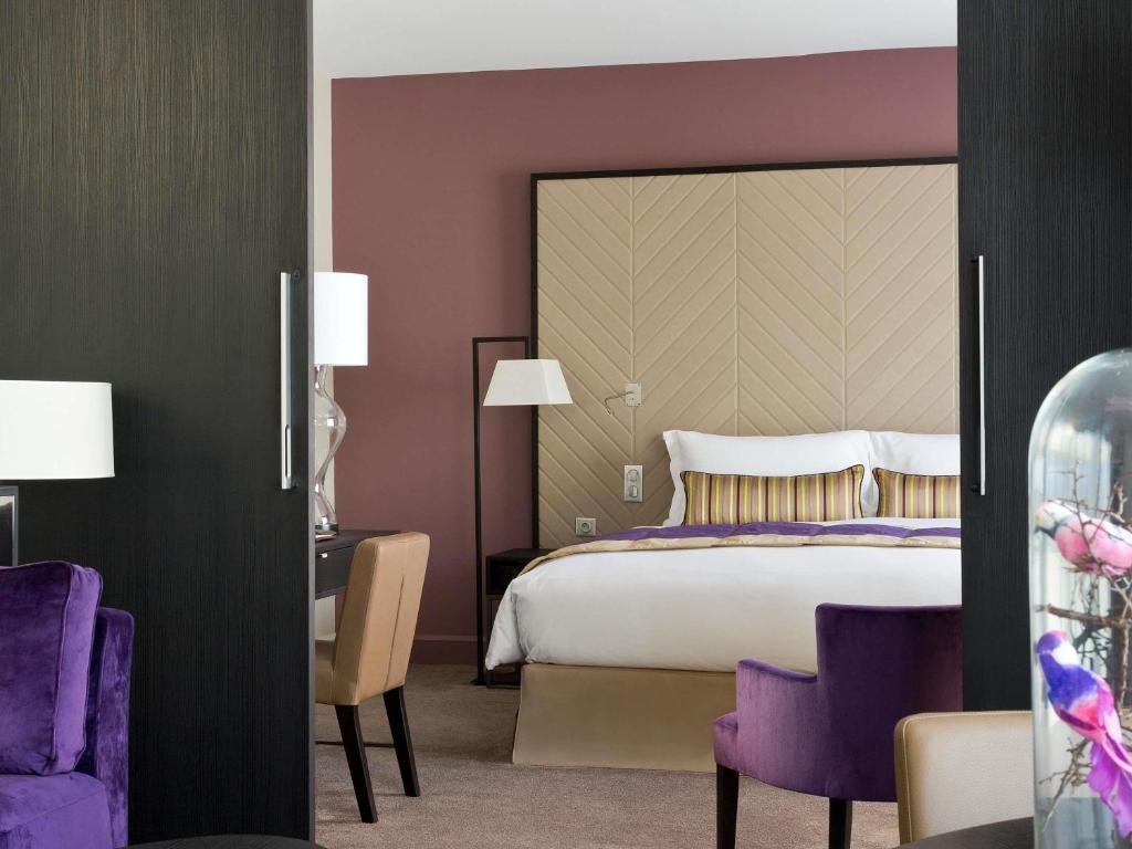 Postel nebo postele na pokoji v ubytování Sofitel Strasbourg Grande Ile