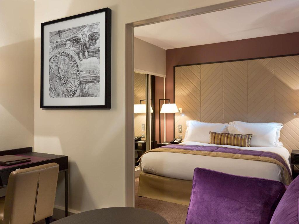 Postel nebo postele na pokoji v ubytování Sofitel Strasbourg Grande Ile