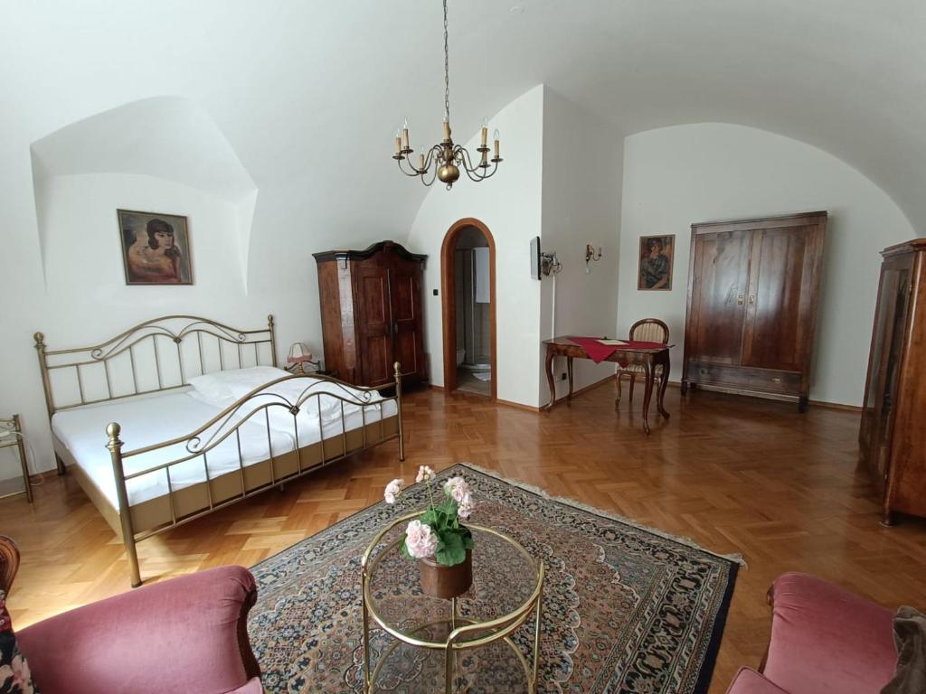 Postel nebo postele na pokoji v ubytování Hotel Gasthof Kohlmayr