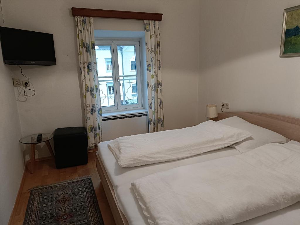 Postel nebo postele na pokoji v ubytování Hotel Gasthof Kohlmayr