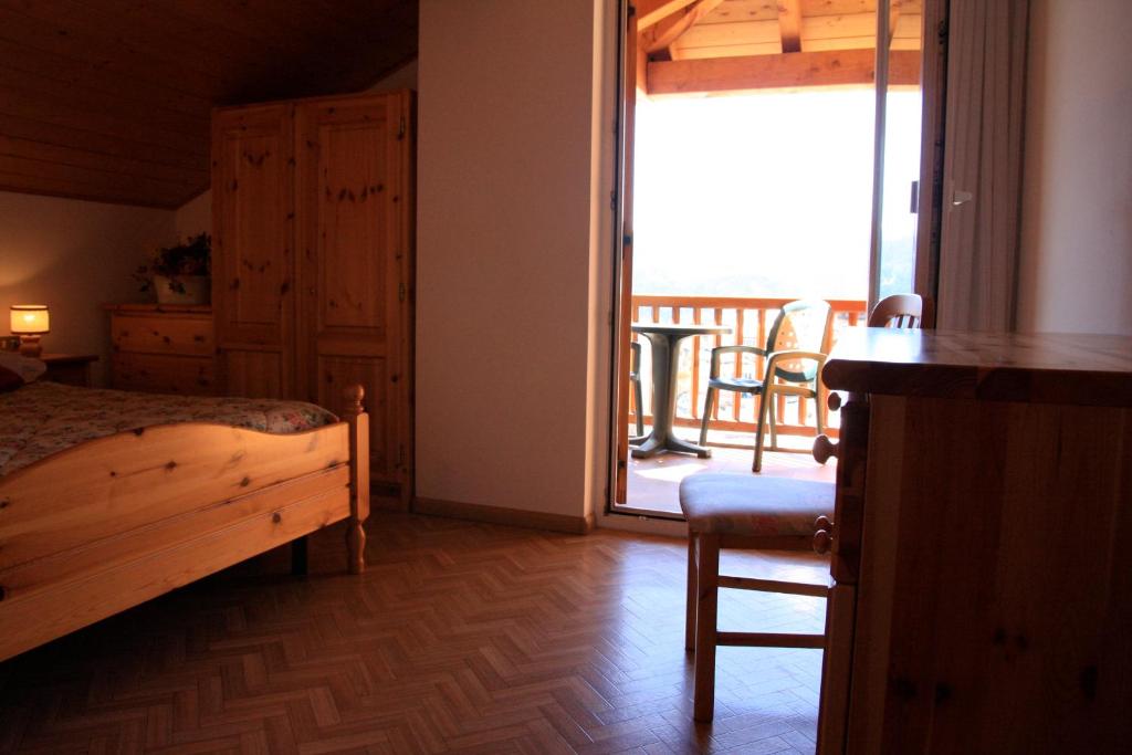 Łóżko lub łóżka w pokoju w obiekcie Residence Villa Boschetto