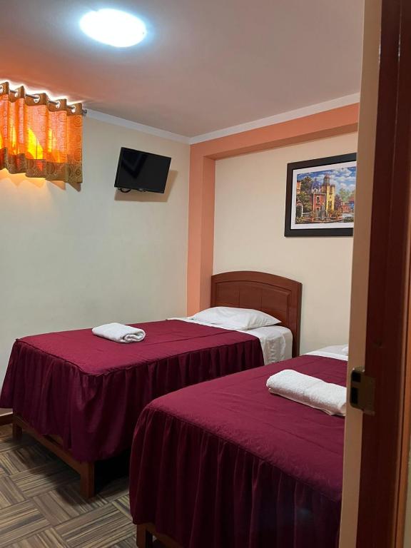 Postel nebo postele na pokoji v ubytování Hotel lucero real