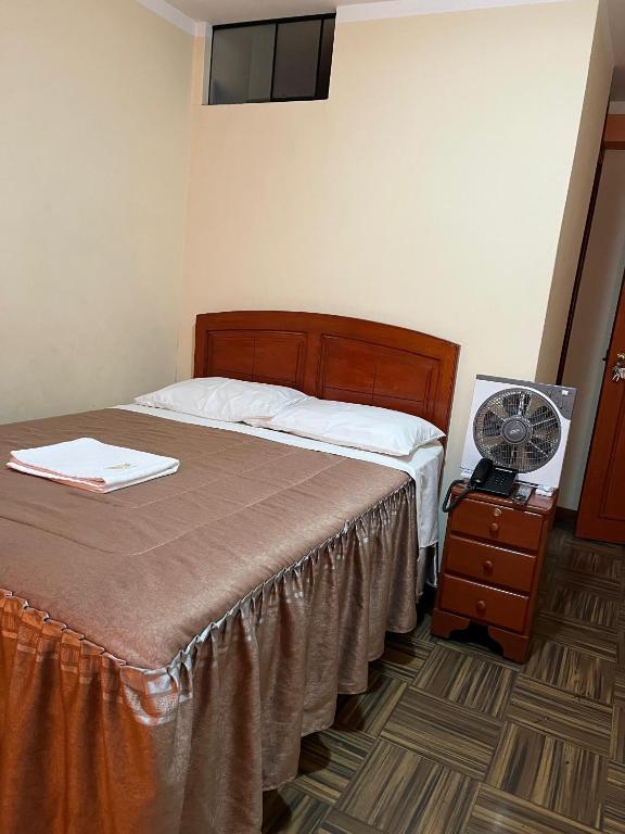 Postel nebo postele na pokoji v ubytování Hotel lucero real