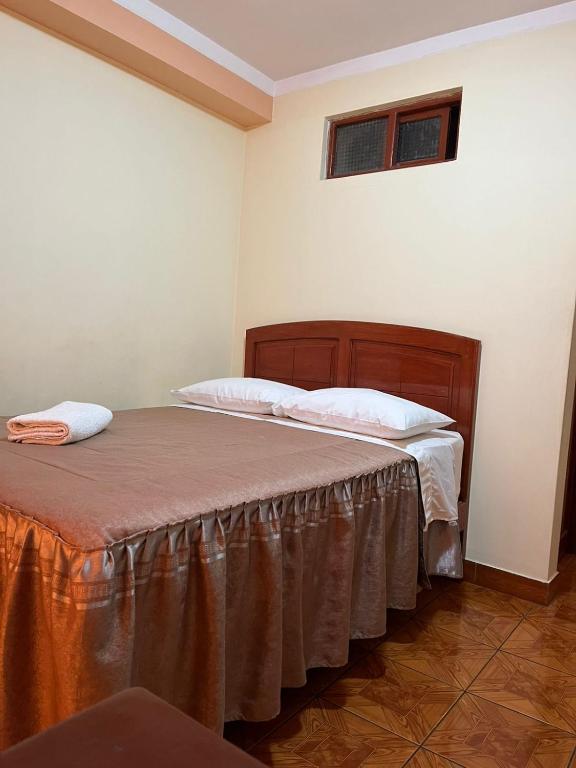 Postel nebo postele na pokoji v ubytování Hotel lucero real