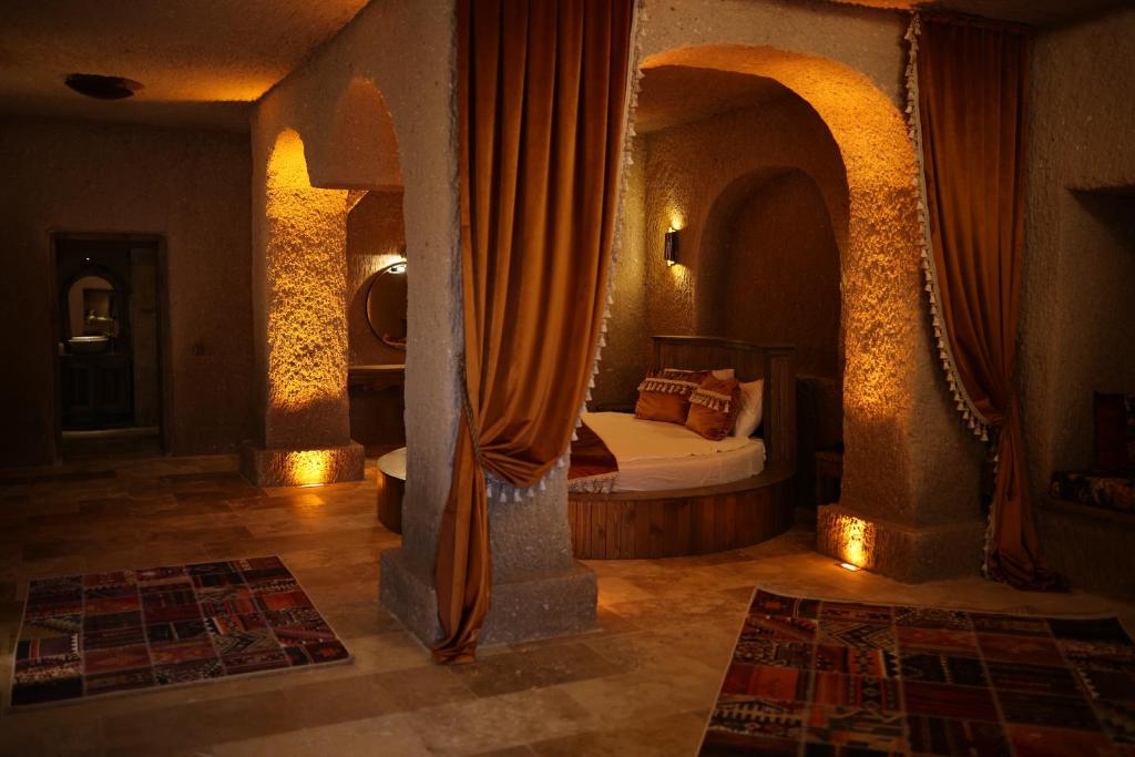 Postel nebo postele na pokoji v ubytování La Fairy Cappadocia
