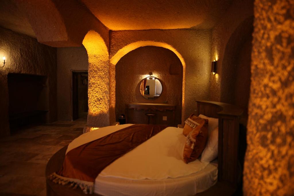 Postel nebo postele na pokoji v ubytování La Fairy Cappadocia