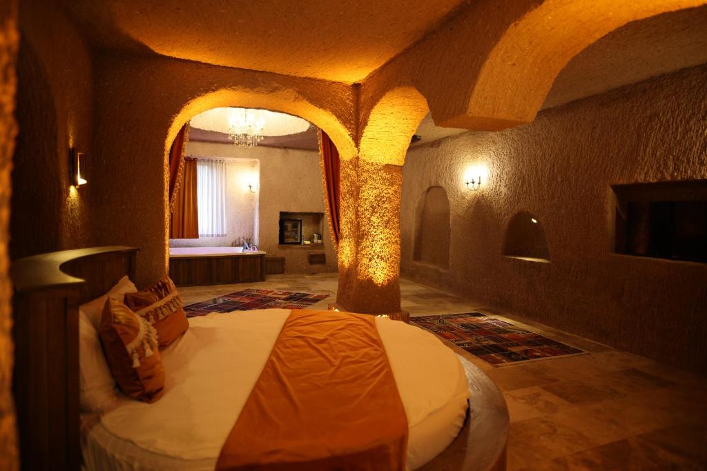 Postel nebo postele na pokoji v ubytování La Fairy Cappadocia