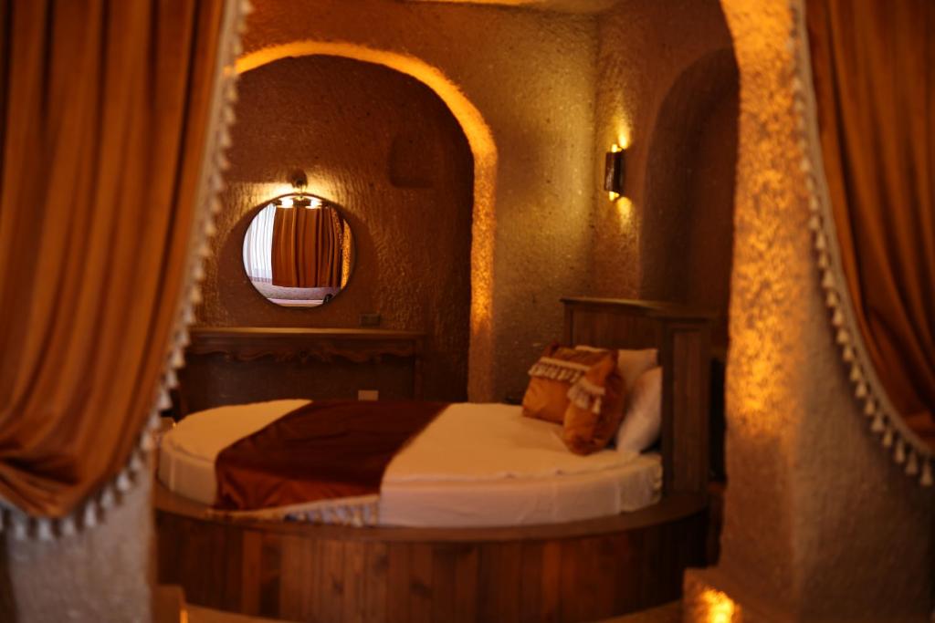 Postel nebo postele na pokoji v ubytování La Fairy Cappadocia