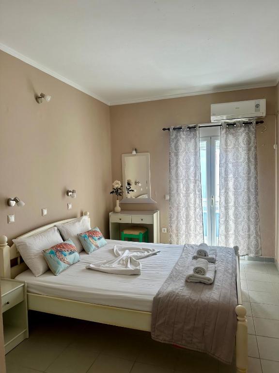Postel nebo postele na pokoji v ubytování Hotel Lenox