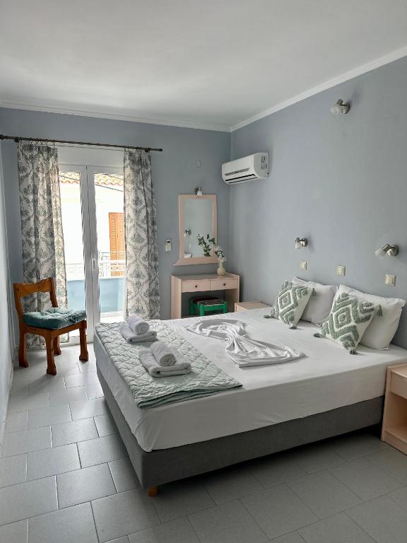 Postel nebo postele na pokoji v ubytování Hotel Lenox