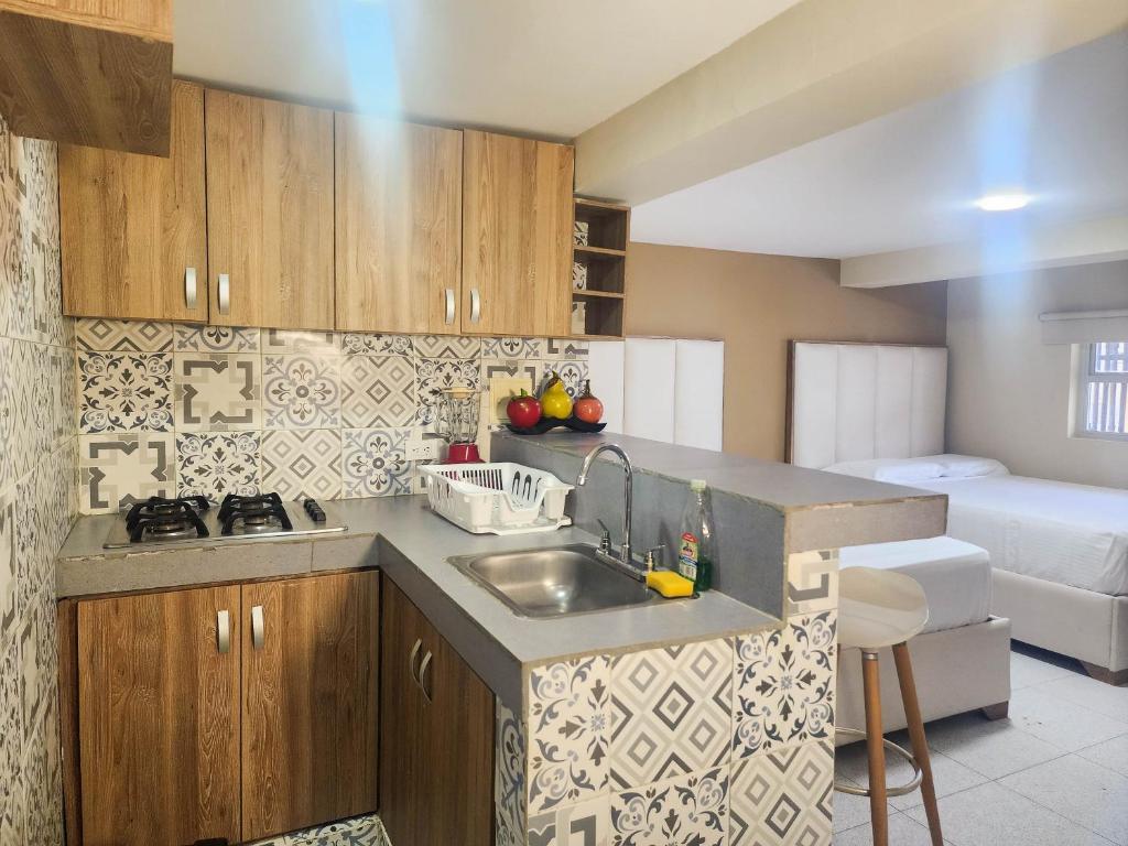 Kuchyň nebo kuchyňský kout v ubytování Hotel y Cabañas Covemar