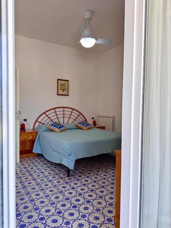 Postel nebo postele na pokoji v ubytování Villa Egidio
