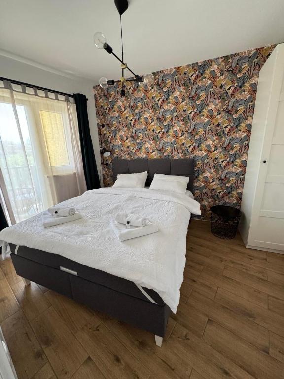 Postel nebo postele na pokoji v ubytování Moms house 2