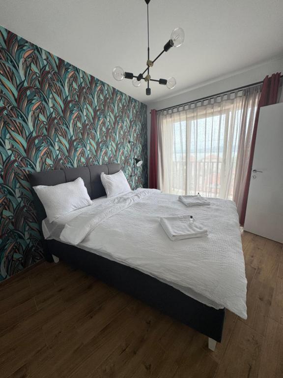Postel nebo postele na pokoji v ubytování Moms house 2