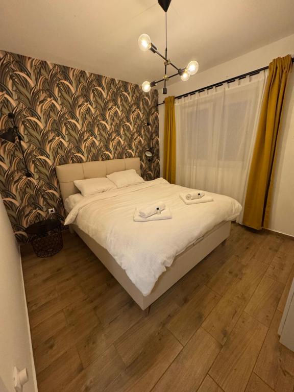 Postel nebo postele na pokoji v ubytování Moms house 2