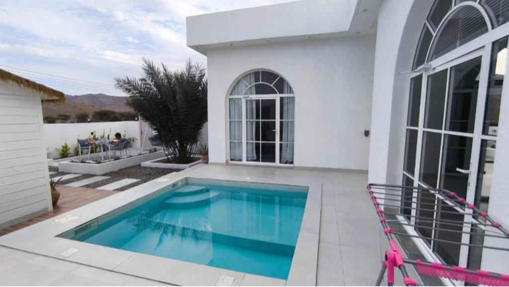 Bazén v ubytování Wadi Bani Khalid - Al Joud Green Hostel 2 nebo v jeho okolí