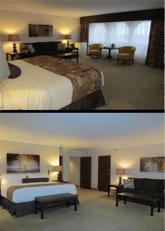 Postel nebo postele na pokoji v ubytování The Fredericton Inn