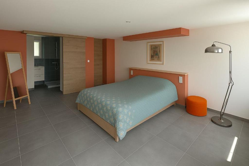 Postel nebo postele na pokoji v ubytování Chambre d'hôtes Caussenarde