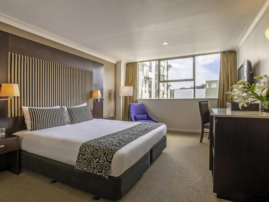 Postel nebo postele na pokoji v ubytování Mercure Wellington Abel Tasman