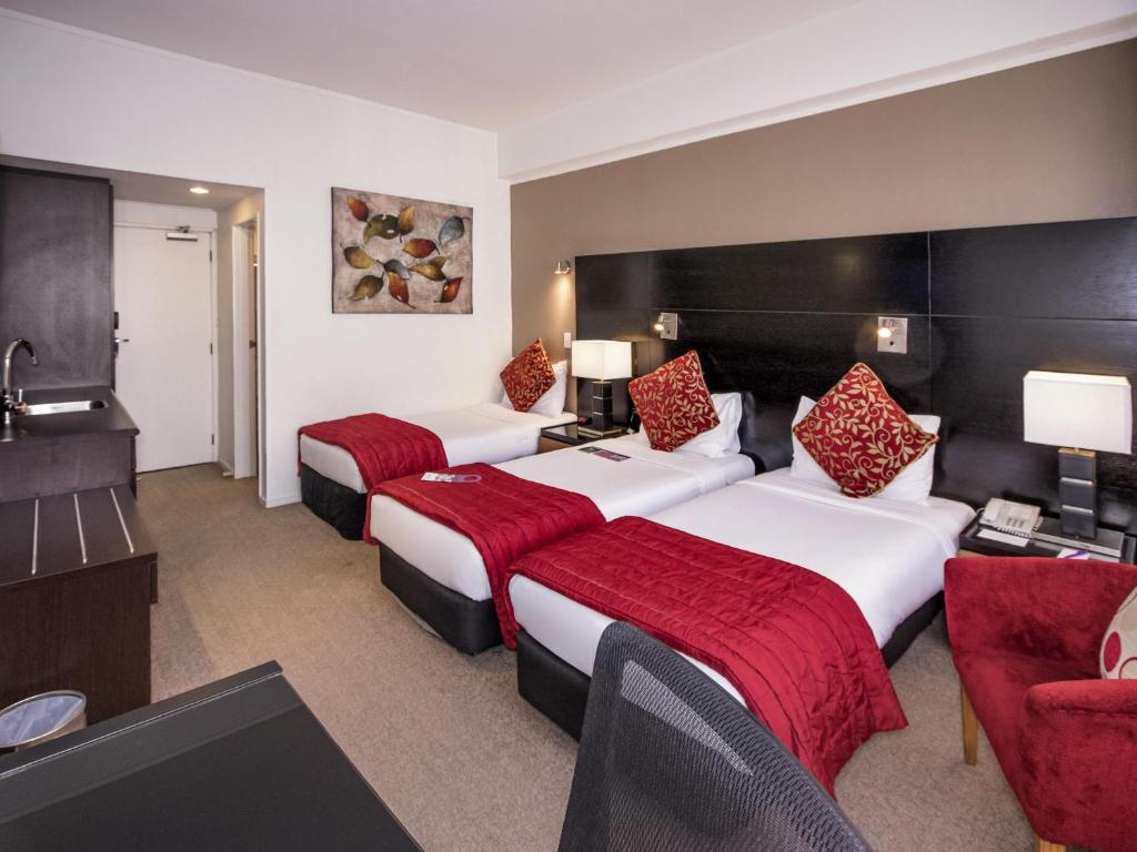 Postel nebo postele na pokoji v ubytování Mercure Wellington Abel Tasman